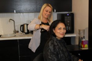 Priti Patel gets a trim from Carrie Scholes proprietor of the Parfait Salon, Coggeshall