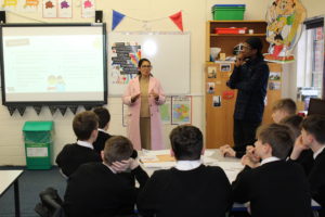 Priti addresses the students taking part in the Be Internet Citizens Workshop at Honywood Community Science School, Coggeshall.