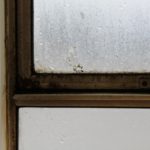 Mouldy window frame corner in one of the classrooms