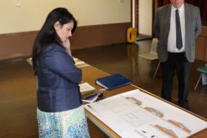 Priti studies the plans for the proposed new Tolleshunt D’arcy Village Hall
