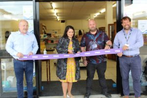 Left to right: Andy Smith YMCA Area Manager, Priti Patel MP, Darren Southall, YMCA Store Manager and Andy Smith YMCA Area Manager at the ribbon cutting ceremony.