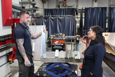 Priti Patel MP with MGJ Engineering staff member, Brett Crittenden during her tour of their workshops