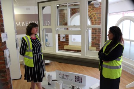 Priti Patel MP and Carol Slade with the Masterframe finished product.
