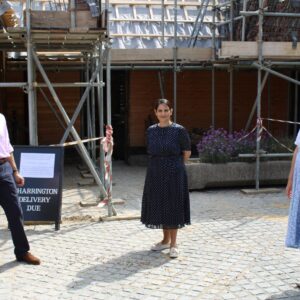 Priti Patel MP with Tower Trustees Nick & Sheila Charrington outside the Essex Barn, which is currently undergoing major restoration works.