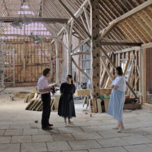 Priti Patel MP with Tower Trustees Nick & Sheila Charrington in the Essex Barn, where she saw the restoration work currently underway.