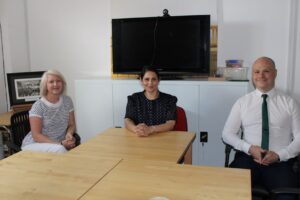 Priti Patel MP with Carolyn Gulleford (left) of the Purposeful Communication Programme for Autism and Adam Dean, Head Teacher designate of the Chatten Free School (right).