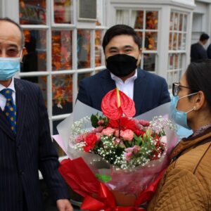 Priti gets a warm welcome from AKA Manager Kenny Wong (left) and owner Alex Lai, as she arrives at the new premises.