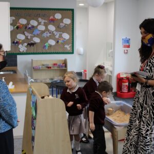 Priti Patel visits a classroom, with Head Teacher - Koulla Anslow, during her tour of the new Lakelands Primary School, Stanway.
