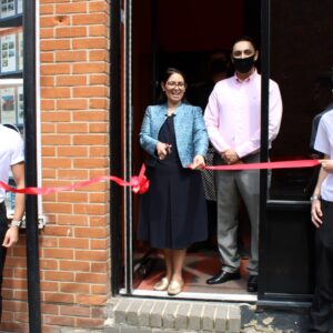 Priti Patel MP with proprietor Mohammad Saleem cuts the ribbon to formally open Flaming Moe’s Restaurant.