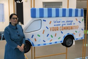 Priti Patel MP with the replica of Eastlight Community Homes’ ice cream van, which was used to tour Essex to video local people talking about their communities.
