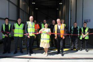 Priti alongside General Manager for North Essex, Scott Fogharty (left) and Managing Director, Lee Seward cuts the ribbon to open the new HGV MOT facility at Motus Truck &Van.
