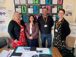 Priti Patel with the members of the Witham All-In social isolation team. From left Carrie Chesterton, Mark Garnham and Joanne Jackson