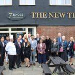 Priti with staff and customers outside the 7 Spices at the New Times restaurant