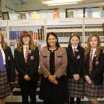 Priti Patel MP with (left to right) student librarians and reading intervention students Tiffany, Ruby, Daisy and Sydney with Head of School, Sherry Zand