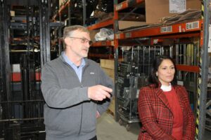Priti with Jim Bromley, Chief Operating Officer at ICEX during her tour of the reprocessing centre at ICEX.