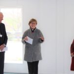 The new classroom is blessed by the Rev. Julie Willmot from St Michael, the Archangel Church, with Chair of Governors Geoff Hicks (left) and Priti Patel MP.