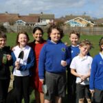 The gardening team at St Luke’s Primary School, Tiptree after their seed planting session, with Priti Patel MP.