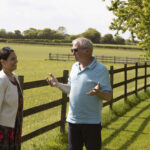 Priti talks with John Stacey whilst on a tour of Whiteheads Farm
