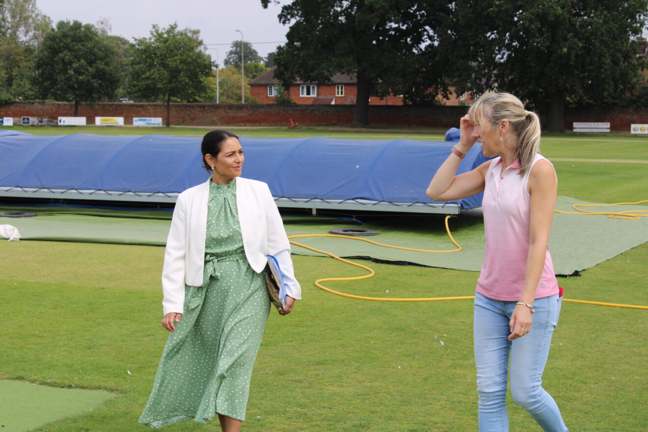 Priti talking with Witham Cricket Club treasurer Caroline Godwin