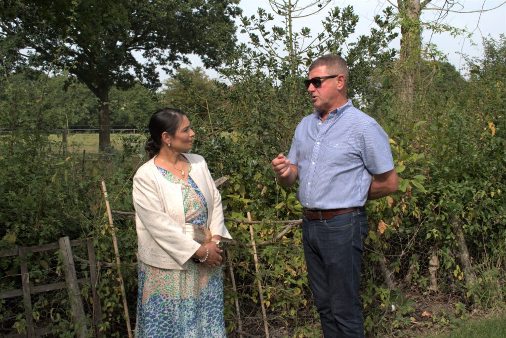 Priti speaking with Kevin Walter of the Wickham Bishops Action Group