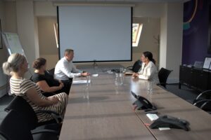 Priti speaking with Chief Executive Douglas O'Neill during her visit to Inntel House