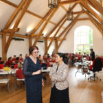 Priti talking with Hatfield headteacher Rebecca Black whilst visiting the schools temporary location at Hatfield Place