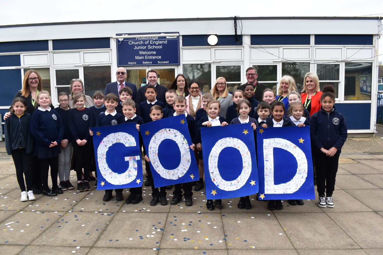 Priti celebrates Howbridge's success with pupils and staff from the school